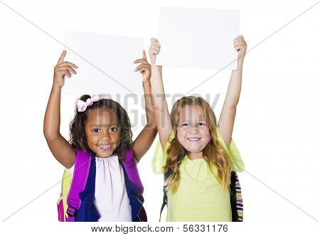 Two cute kids holding up a blank sign