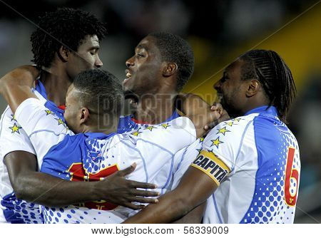 BARCELONA - DEC, 30: Cape Verdean players celebrating goal during the friendly match between Catalonia and Cape Verde at Olympic Stadium on December 30, 2013 in Barcelona, Spain.