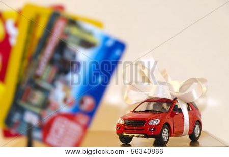 Red Machine In A White Ribbon And Discount Cards