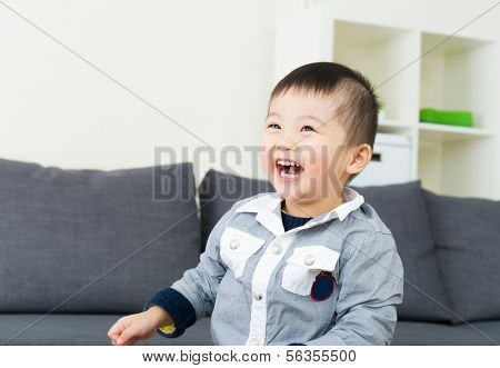 Asian little boy giggle