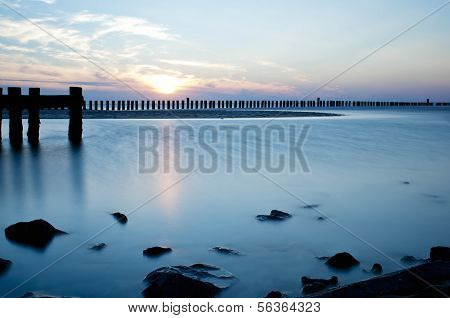 Wave Flows Around Wooden Breakwater