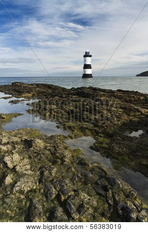 Penmon Beach, Anglesey, Wales With Lighthouse.