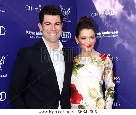 LOS ANGELES - JUN 7:  Max Greenfield, Tess Sanchez at the 13th Annual Chrysalis Butterfly Ball at Private Mandeville Canyon Estate on June 7, 2014 in Los Angeles, CA
