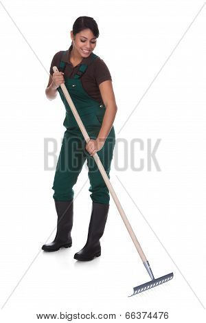Young Female Gardner With Gardening Tools