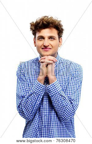 Happy casual man standing over white background