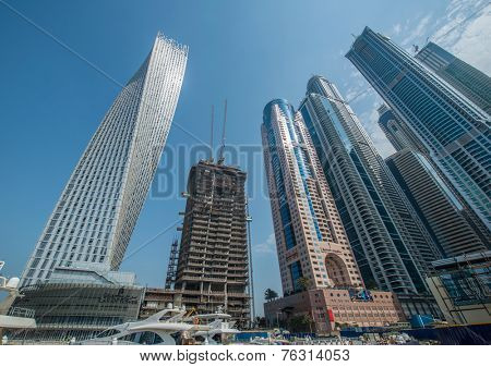 Dubai - AUGUST 9, 2014: Dubai Marina district on August 9 in UAE, Dubai. Dubai Marina district is a popular residential and business area.