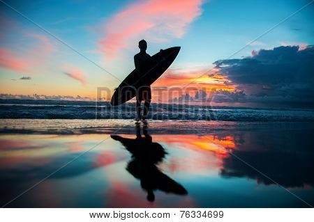 Surfer with board