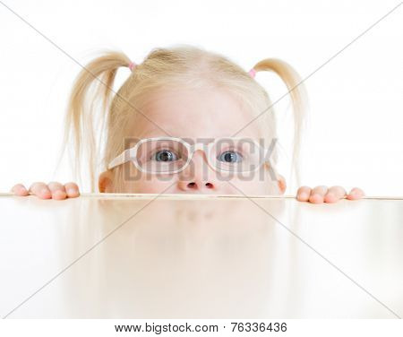 Frightened kid or child in eyeglasses playing isolated on white