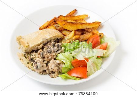 Chicken and mushroom suet pudding, steamed in a a basin, and old-fashioned English speciality