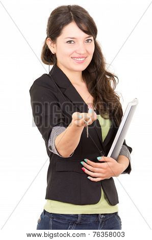 portrait of beautiful woman real estate agent holding a key
