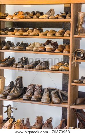 Shelf With Old Shoes