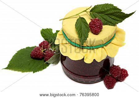 Glass jar with raspberry jam and fresh berries isolated  white background
