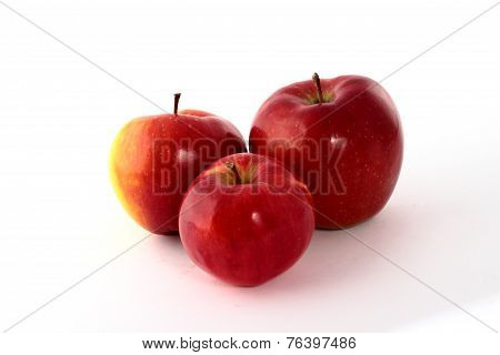 Red apples on a white background