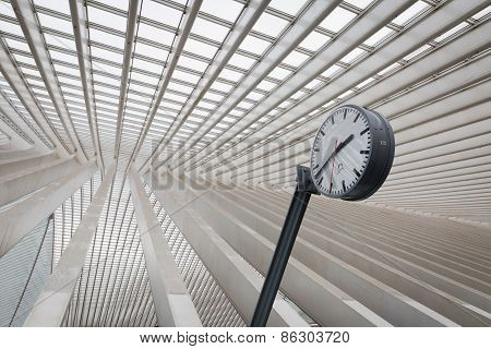 A clock in an interior of a train station
