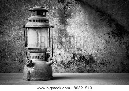 still life of old hurricane lamp