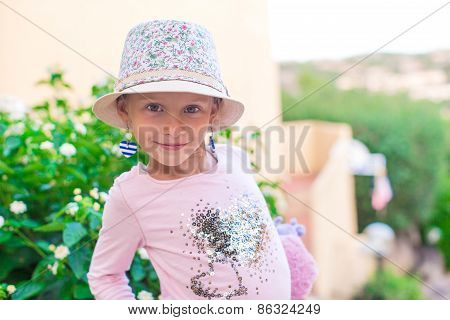 Adorable little girl have fun outdoors