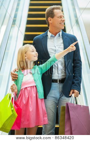 Father And Daughter Shopping.