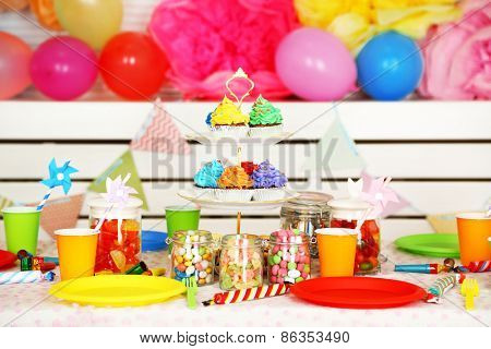 Prepared birthday table with sweets for children party