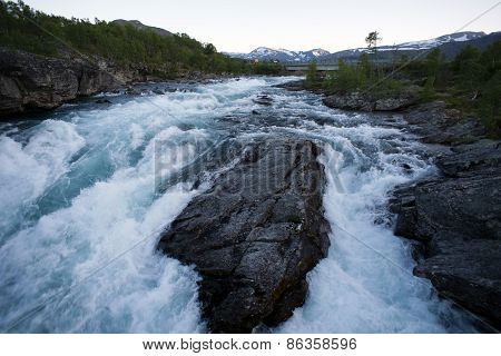 Raging River In Mountain Plateau Valdresflye, Jotunheimen, Norway