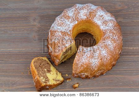 a marble cake for dessert. symbolic photo for taxes, fees and shares