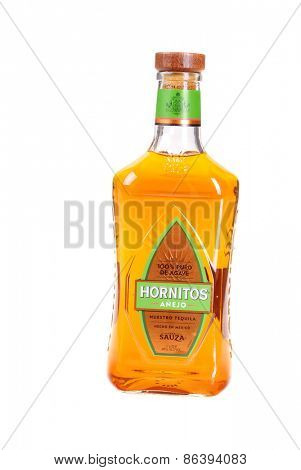 Hayward, CA - March 21, 2015: Bottle of Hornitos 100% Agave tequila anejo isolated on white - illustrative editorial