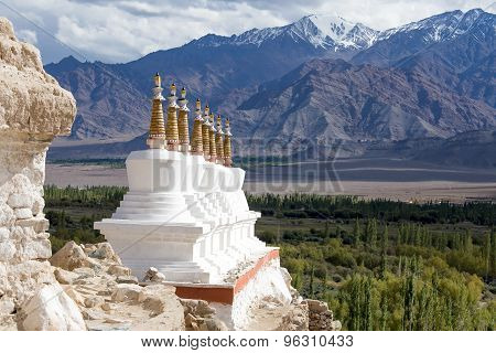 Buddhist Chortens (stupa) And Himalayas Mountains In The Background Near Shey Palace In Ladakh, Indi