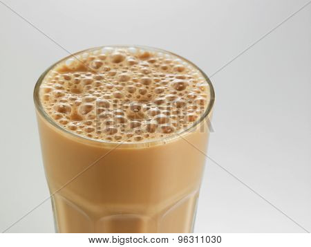 Big glass Tea with milk or Teh Tarik in Malaysia