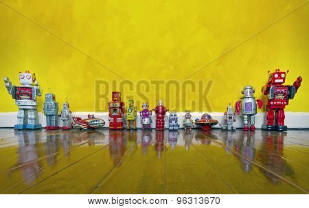 old tin toys on a wooden floor