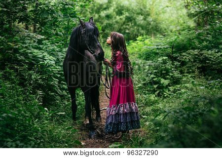 Beautiful gypsy in violet dress