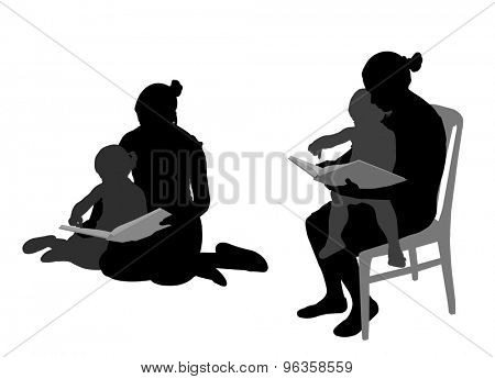 mother reading book to child silhouettes