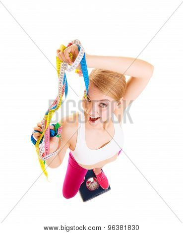 Happy Woman On Weighing Scale. Diet Weight Loss.
