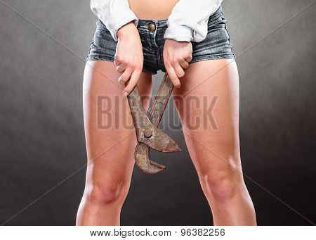 Closeup Of Sexy Woman With Monkey Wrench. Feminism