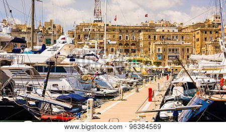 yachts in Valleta port on the background of the city in Malta