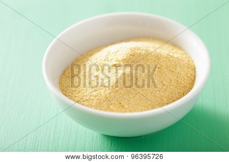 vegan nutritional yeast flakes in bowl