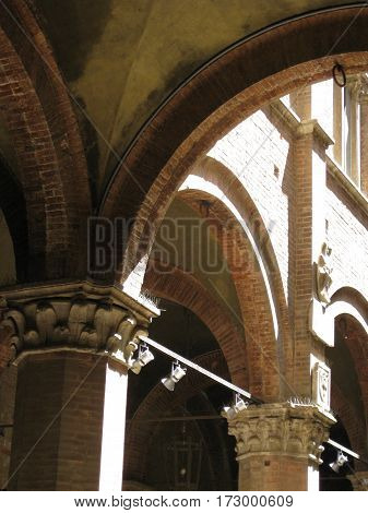Architectural detail adorning old building in Italy