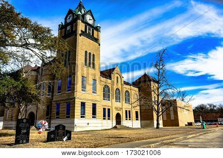 Prattville Alabama USA - January 28 2017: Clock tower of the Autauga County Courthouse with the memorials visible.
