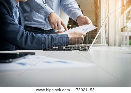 Team Work Process. Young Business Managers Crew Working With New Startup Project. Labtop On Wood Tab