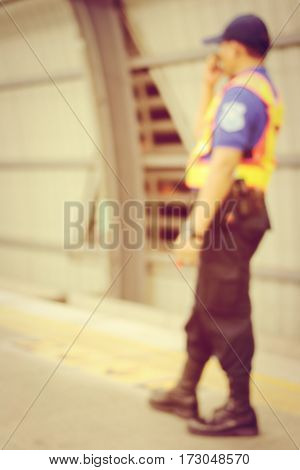Blurred Image Of Passengers Waiting For Train & Security Man Is Working At Railway Station, Train St
