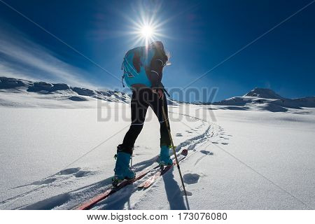 Ascent With Ski Mountaineering And Climbing Skins For A Single Woman