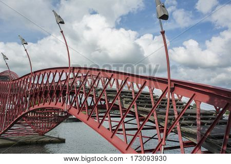 Section of sinuous pedestrian bridge Python in Amsterdam in the day