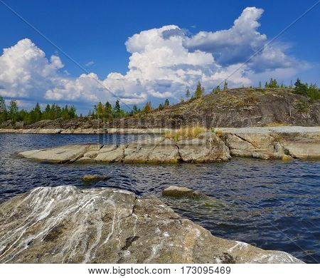 Balaam. The rocky coast of the island. Sunny summer day. Famous Russian Orthodox places