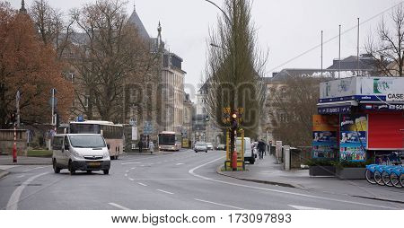 Grand Duchy of Luxembourg Luxembourg- January 032017: Citizens go on on his own business outside moving cars
