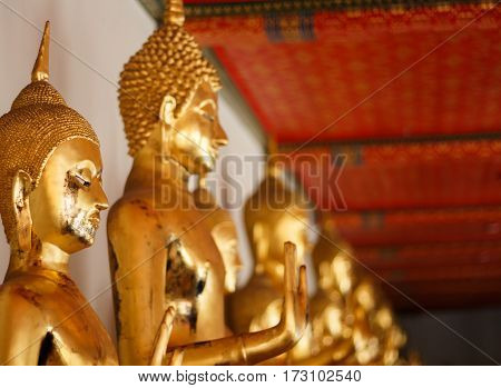 Golden buddha statue on temple Bangkok, Thailand.