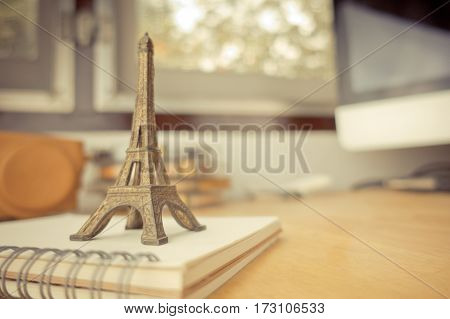 Travel agency planning for France Paris on book