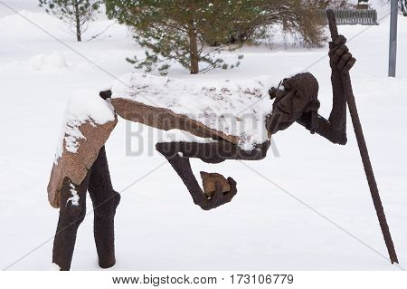 Moscow, Russia - January 17, 2017: Sculpture gather stones sculptor Oleg Garkushenko Muzeon in the park in Moscow