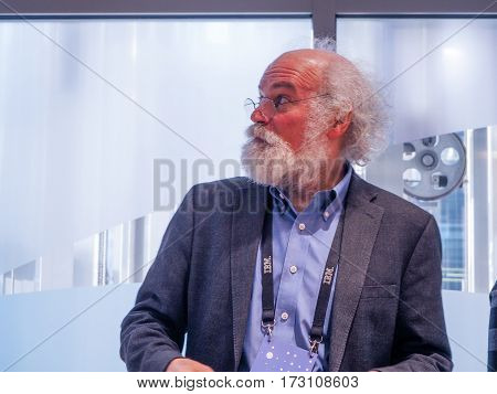 MUNICH GERMANY - FEBRUARY 16 2017: IBM Fellow in the IBM Internet of Things division John Cohn presents Watson IoT headquarter to journalists in Munich Germany on February 16 2017.
