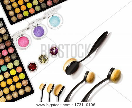 Professional make-up tools isolated on white. Beauty and fassion concept. Top view.
