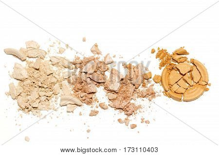 Gold beige eye shadow crushed cosmetic isolated on white background.Beauty fassion and style.