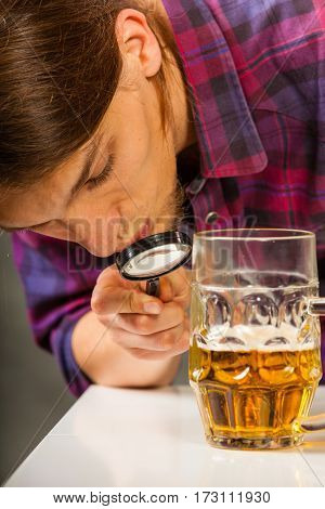 Careful Bartender Checking Beer.