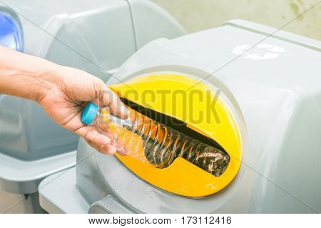 Disposable water bottles , litter bin in park
